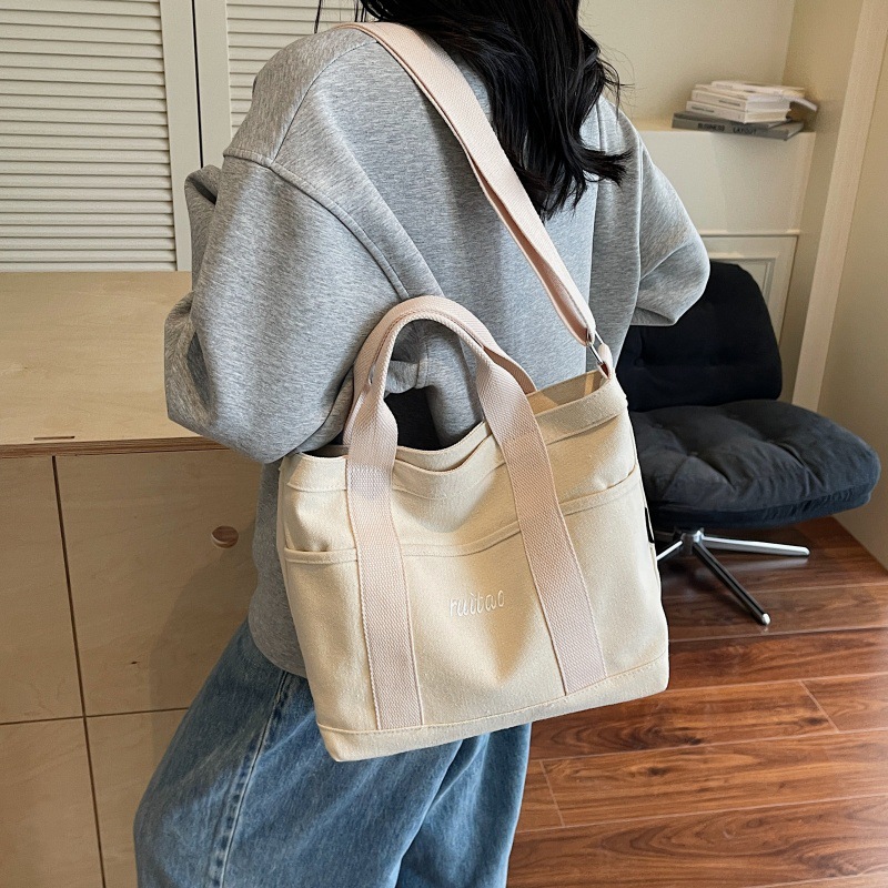 Bolso Tote de moda coreana 2025 verano nuevo estilo bolso de hombro estilo universitario bolso de mensajero de lona de color de contraste mujer
