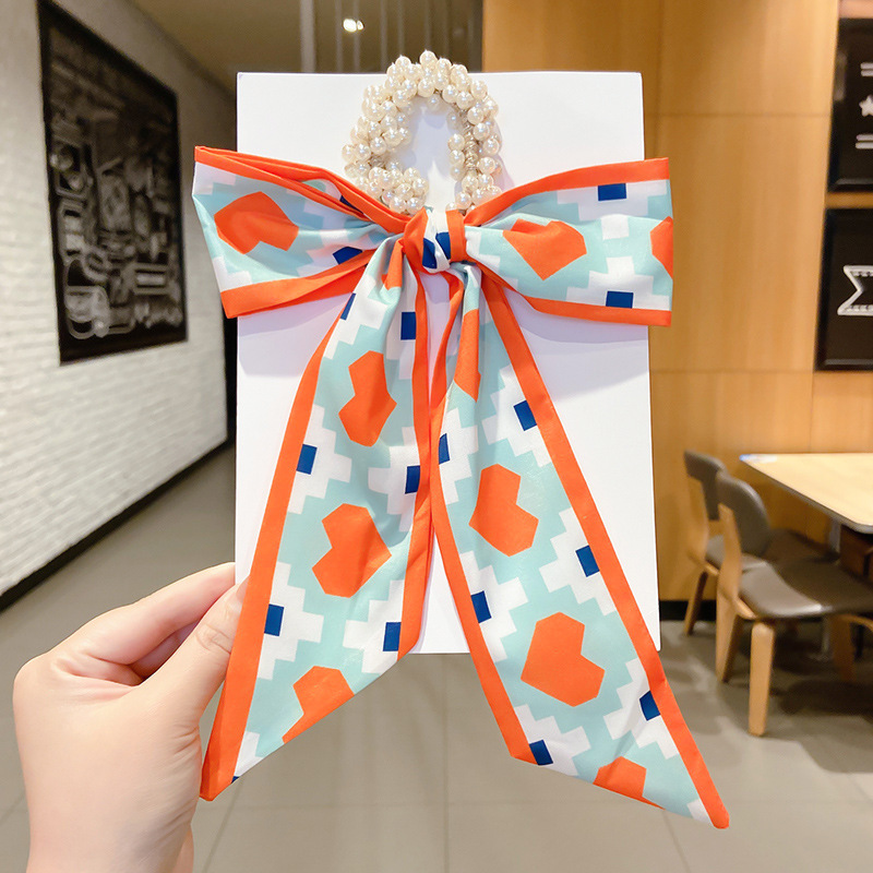 Banda de pelo de bufanda de seda corbata de pelo femenina Shixi Cinta de lazo de perla sale todo partido cuerda de cabeza Shixi 2021 cabello nuevo