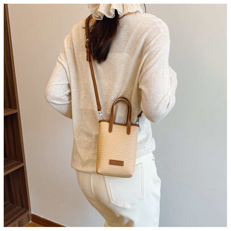 Summer straw woven beach bag 2025 New style seaside vacation handbag, simple and versatile bucket bag, woven crossbody bag undefined