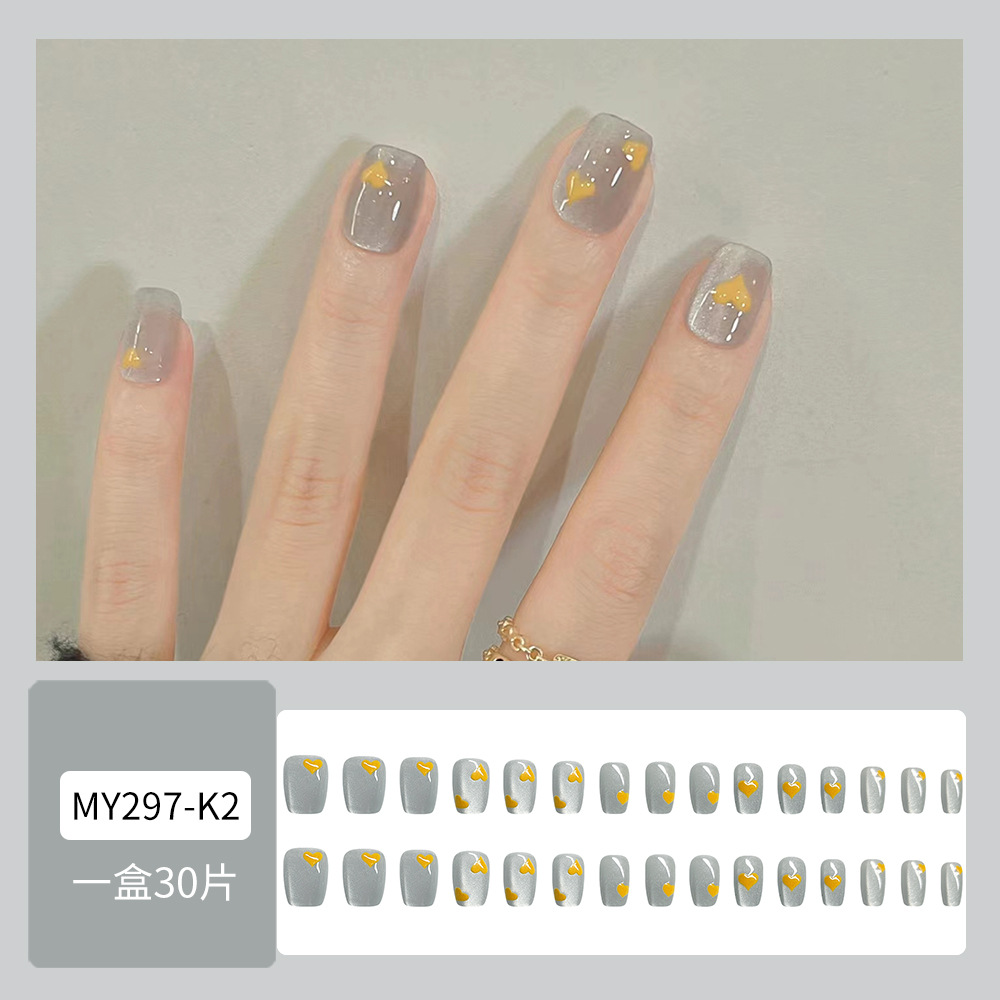 Ventas de chatarra encantadoras uñas de corazón amarillo dulce parche de uñas de ballet corto 30 piezas de uñas de ojo de gato