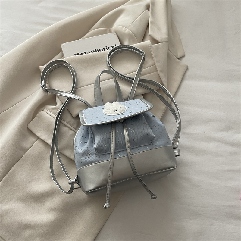 Mochila de moda coreana encantadora nicho femenino diario dulce estrella ondulado punto mochila de estudiantes mochila universal