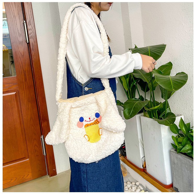 This autumn and winter hand-held bag with big ears, cute animal-embroidered fur, and a simple lambskin large-capacity student backpack undefined