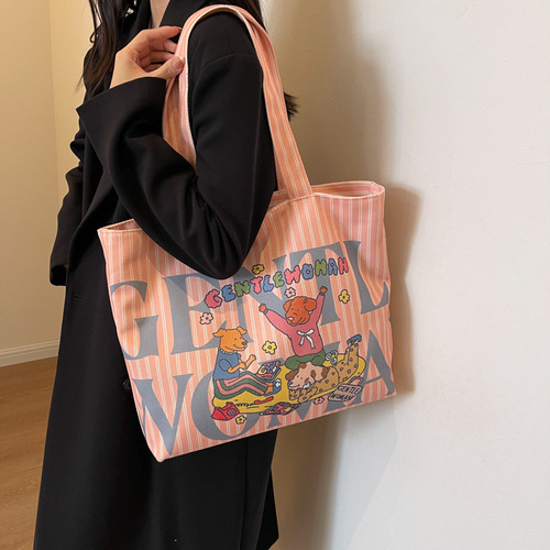 字母印花帆布单肩包包女大容量卡通托特包可爱少女通勤手提包跨境