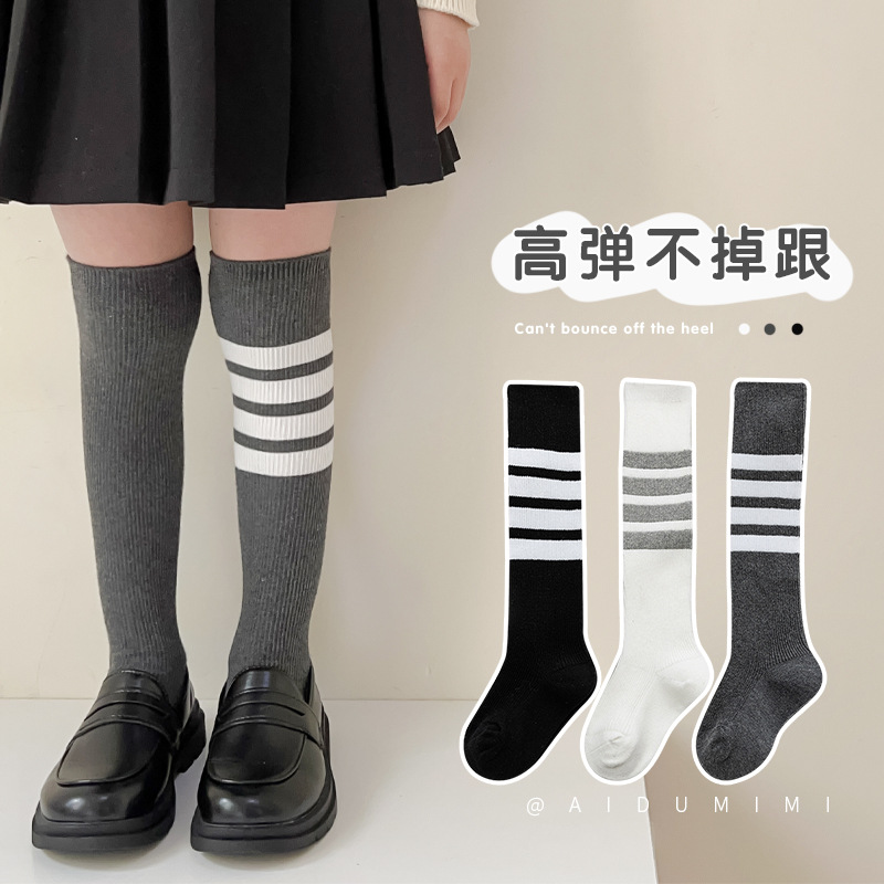 2023 nuevos calcetines para niños primavera y otoño calcetines largos sobre la rodilla calcetines para niños y niñas estilo universitario medias al por mayor