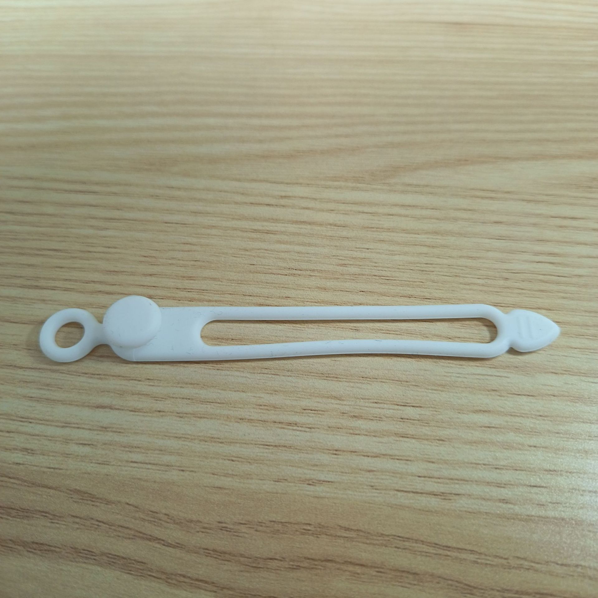 El cable de datos contiene la correa de silicona del gestor de la línea de carga del cable de auriculares del bobinador de la correa de silicona.
