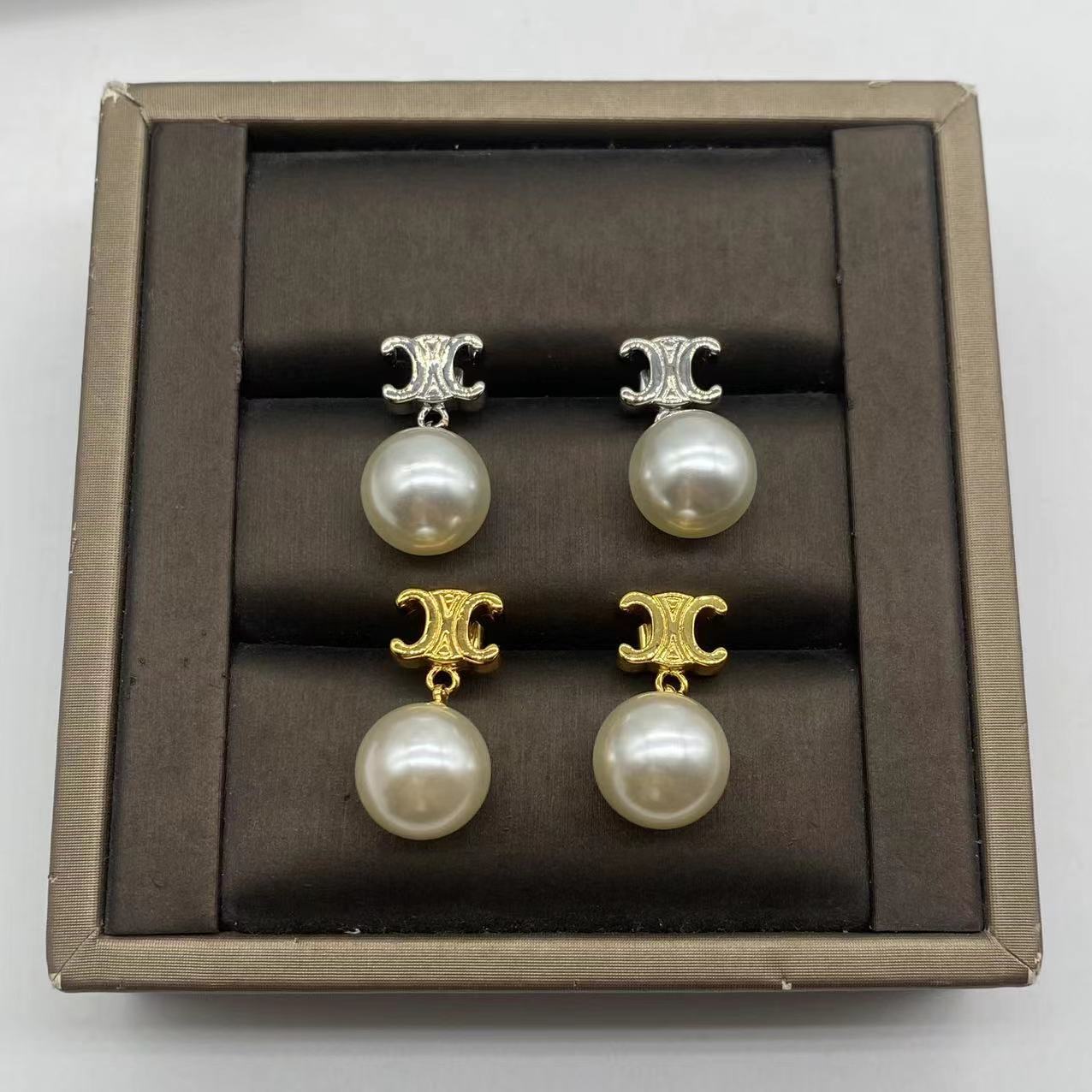 celi new style Arc de Triomphe light luxury elegant golden big pearl earrings female summer niche design high-grade earrings earrings earrings