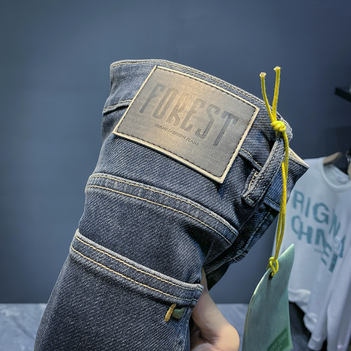 Jeans élastiques de marque de mode européenne pour les nouveaux styles de printemps et d'automne, pantalons polyvalents slim fit haut de gamme pour hommes_voghion.com
