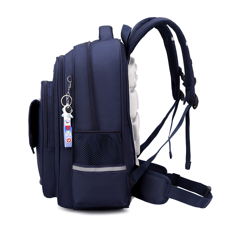 2025 nueva mochila escolar para niños de primaria, niños de tercer a sexto grado, impermeable, primer grado, protección de espalda ligera para reducir la carga