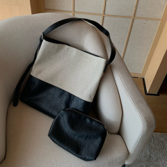 喬戈夏の新型の亜麻の材料はPUのショルダーバッグの大容量のハンドバッグをつなぎ合わせます。