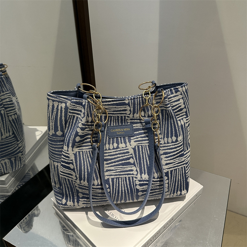 Bolso Tote simple y de gran capacidad para mujer 2024 nuevo bolso de hombro a rayas de moda coreana bolso de axila de arte relajado