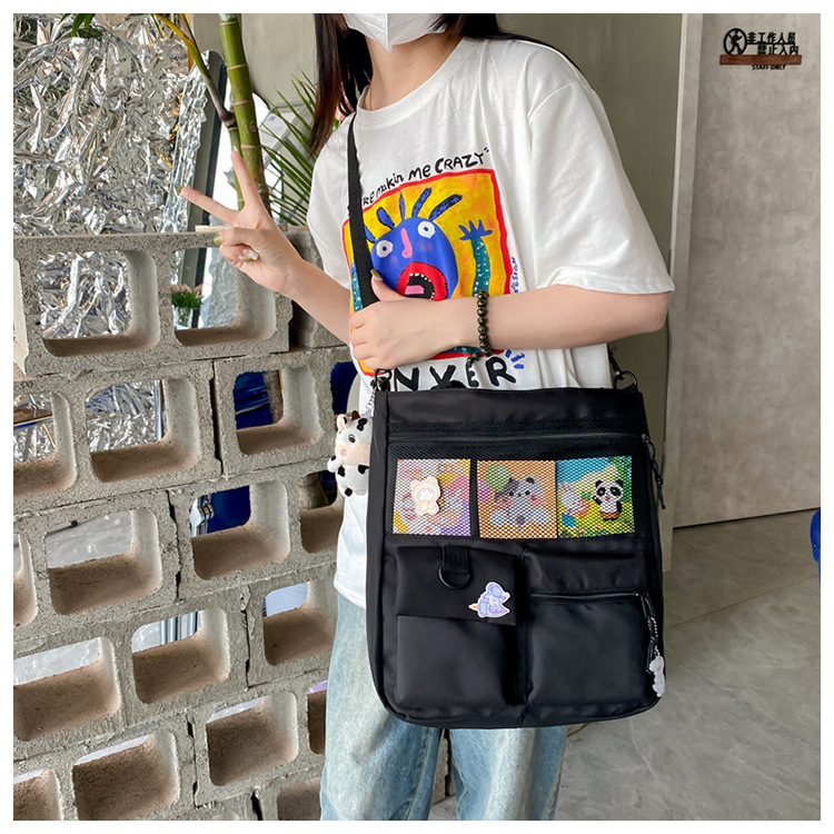 Large-capacity Japanese-style single-shoulder canvas bag for girls, versatile crossbody, ins, a tote bag for junior high school students' classes, and a schoolbag for after-school tutoring undefined