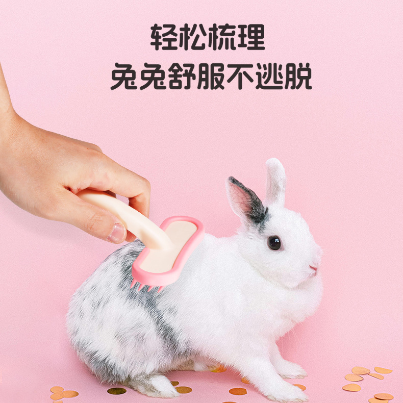 Fábrica al por mayor peine para mascotas perro gato peine de silicona masaje peine de dientes suaves peine de pelo flotante artefacto de depilación de conejo