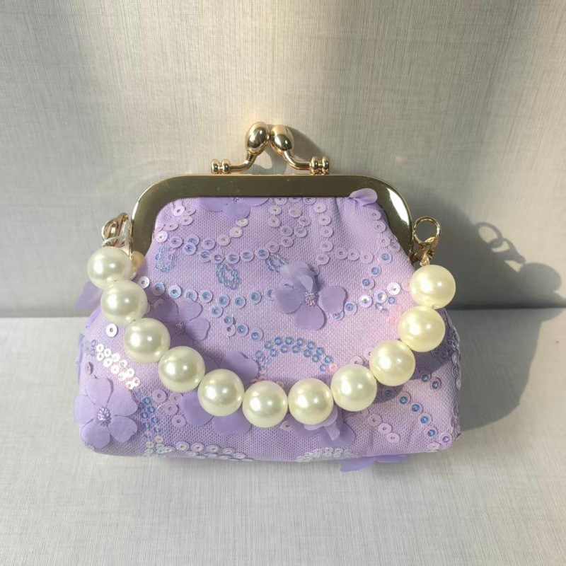 2025 primavera y verano estilo caliente moda casual niños dulces bolsa de gelatina mini bolso de mensajero de un solo hombro variedad al por mayor