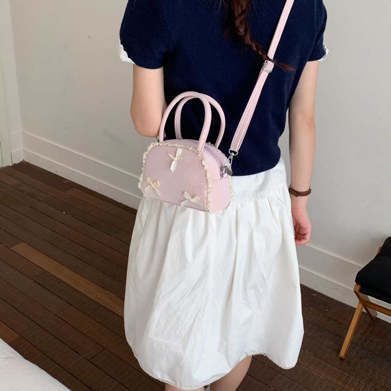 2026 nuevo bolso Macaron mini bolso de lápiz labial diario lindo arco de hombro bolso de concha mochila