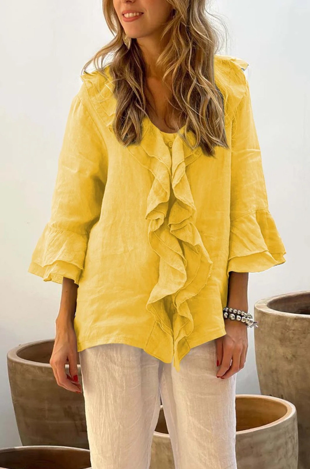 2024 estilo europeo y americano transfronterizo otoño color sólido nueva moda con cuello en V mangas voladoras con volantes suelta casual top mujer