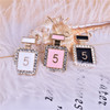Golden metal perfume, earrings, bracelet, pendant, Chanel style