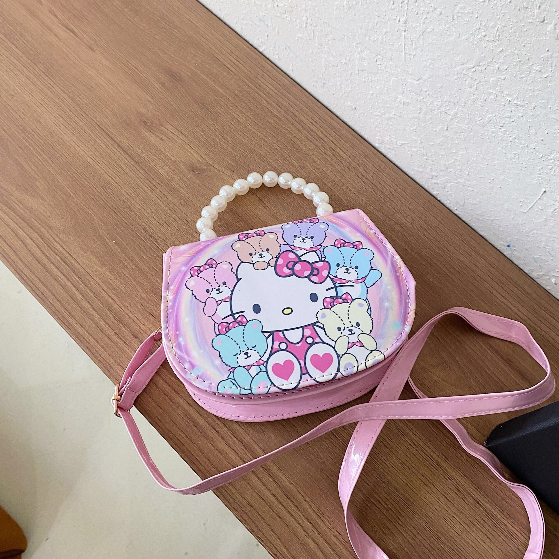 2024 nueva bolsa de hombro para niños princesa Elsa dibujos animados Yue Gui perro coreano nicho perla bolsa de mano inclinada
