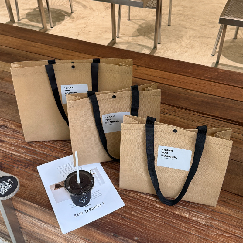 衣料品店不織布ハンドバッグ厚みのあるウェビング女性の服ギフトショッピング包装袋ギフトバッグ卸売|undefined