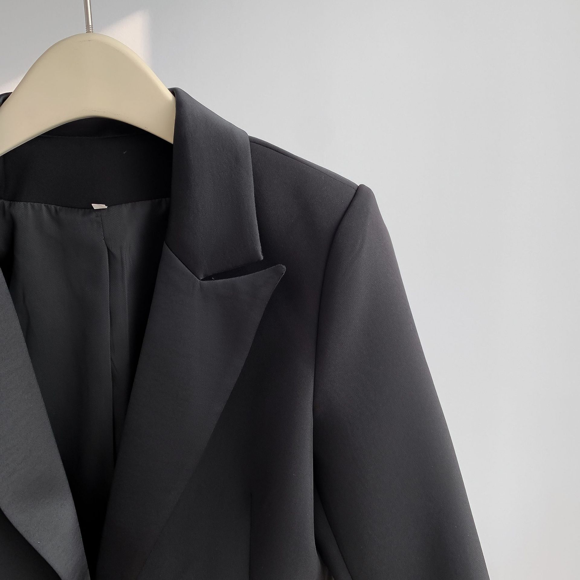 Abbigliamento da donna Autunno e inverno Nuovo bottone singolo Casual Suit Pantaloni Risvolto irregolare Semplice Bianco neve Giacca + Pantaloni_voghion.com