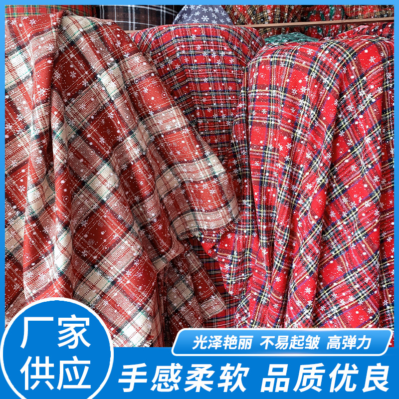现货全涤晴纶开司米色织印花格子雪花布圣诞工艺品装饰玩具面料