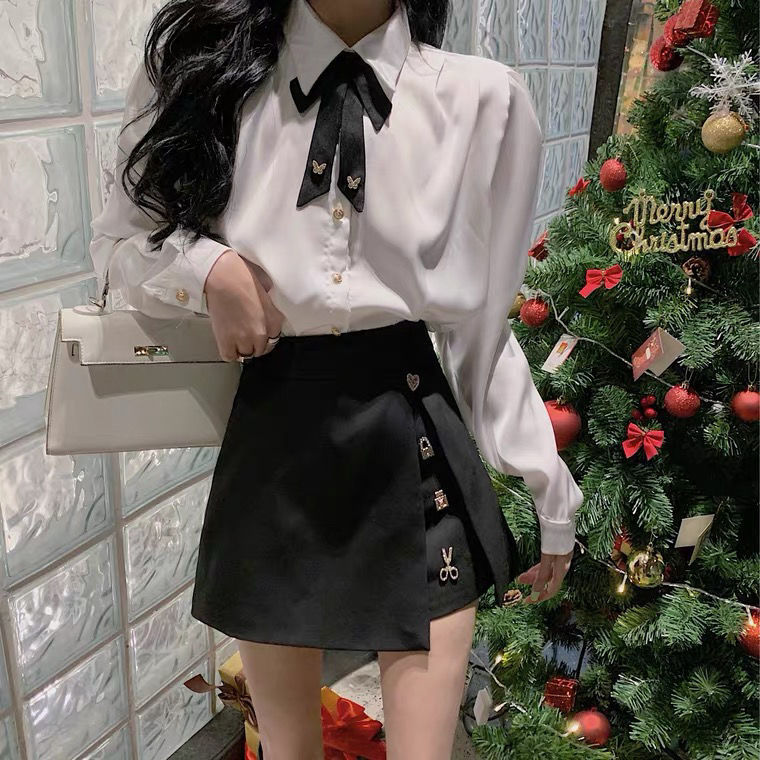 GraceChic Frühlingsoutfit: Zweiteiliges Set aus Bluse mit Schleife, Puffärmeln und hochtailliertem, schwarzem Rock mit Schlitz_voghion.com