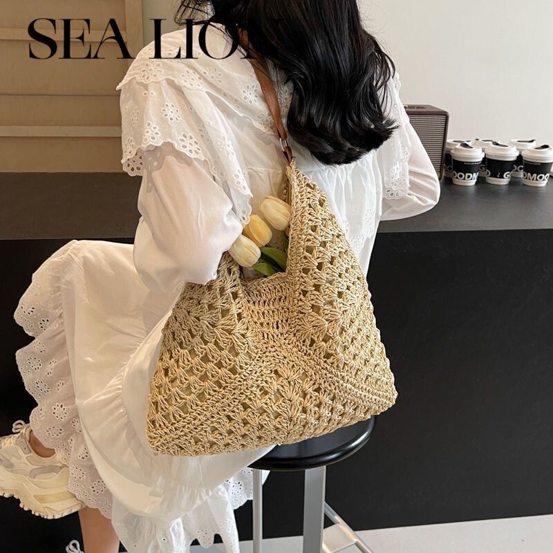 Relaxed Korean Style Cut Out Large-capacity Straw Armpit Bag Women's Versatile Tote Bag Shoulder Seaside Vacation Beach Bag Relaxed Korean Style Cut Out Large-capacity Straw Armpit Bag Women's Versatile Tote Bag Shoulder Seaside Vacation Beach Bag