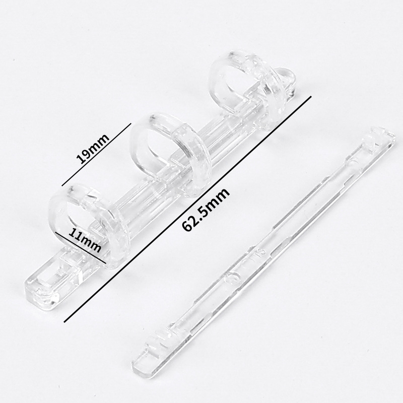 Clip transparente de tres agujeros