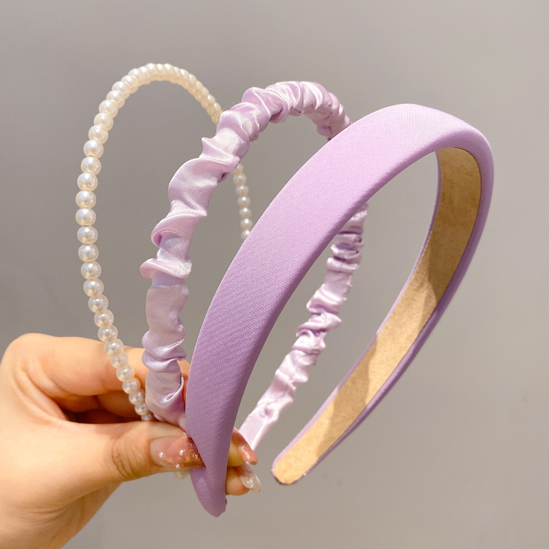 A principios de la primavera, la banda de cabello para mujeres en línea, 2025 nuevo lavado de cara de presión de tarjeta de cabello para el cabello, banda de cabello de perlas, banda de cabello para mujeres.