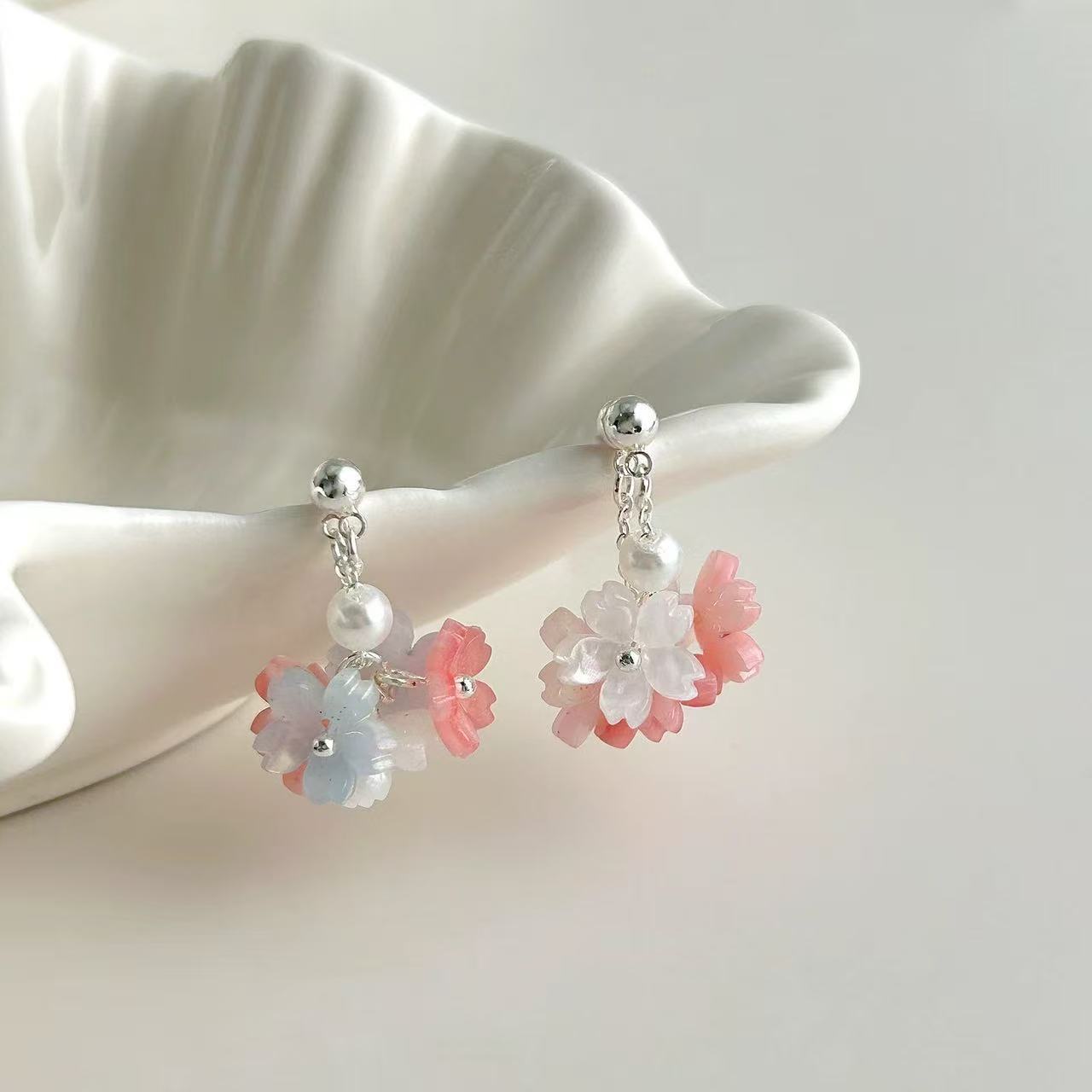 Earrings with tassels from pearl, flowered