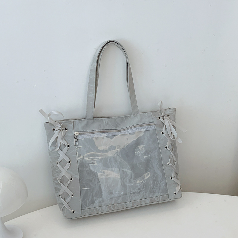 Bolsa de gran capacidad para mujeres dulces niñas de dos dimensiones transparentes 2025 primavera y verano pequeñas bolsas de hombro bajo la axila fresca