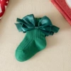 With bow, green