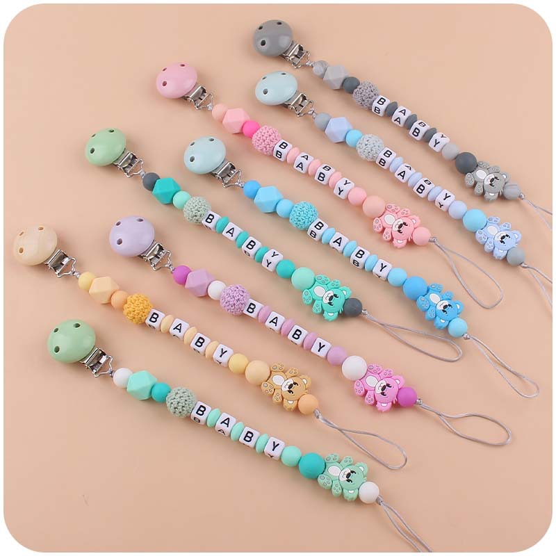 Nuevo bebé suministros de dibujos animados animal oso calmante bebé Cadena de chupete de silicona mordedura cadena anti-caída molar
