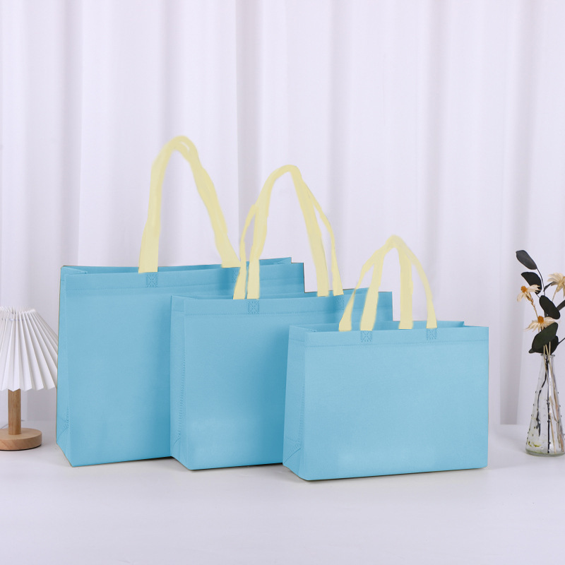 Bolsas de compras no tejidas gruesas para tiendas de ropa, bolsas de embalaje de regalo ecológicas laminadas personalizadas, bolsas de mano no tejidas