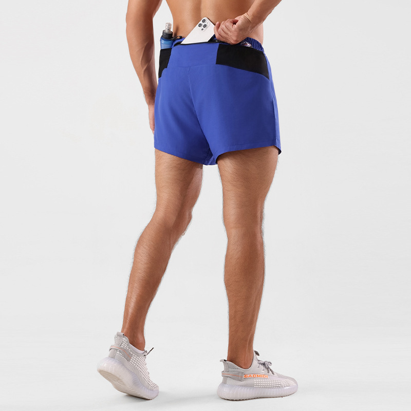Pantalones cortos deportivos de tres puntos para hombres de verano de secado rápido que absorbe la humedad maratón profesional corriendo pantalones de entrenamiento físico de doble capa anti-exposición