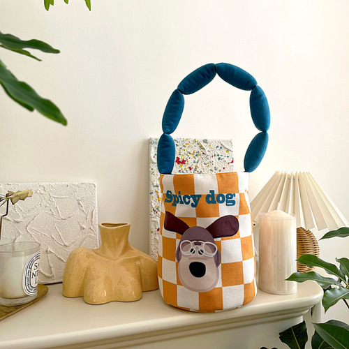 Korean-style cute illustrated puppy bucket bag, handheld canvas tote, trendy Instagram-inspired mom bag, and the new cylindrical lunch box pouch.
