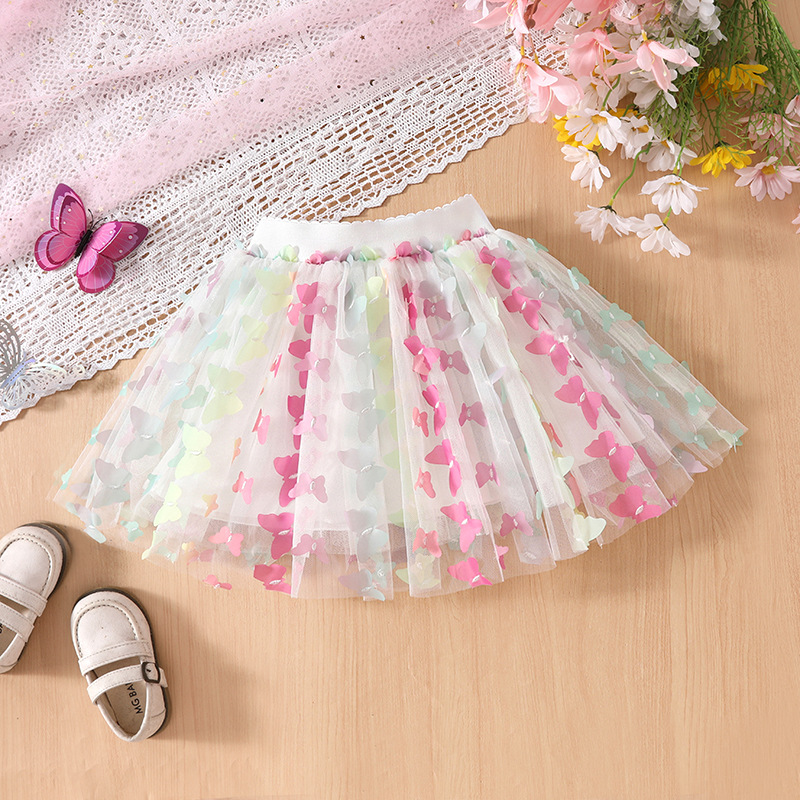 Ropa infantil al por mayor niñas coloridas mariposa tridimensional falda corta de verano falda de princesa de cuatro estaciones y media falda