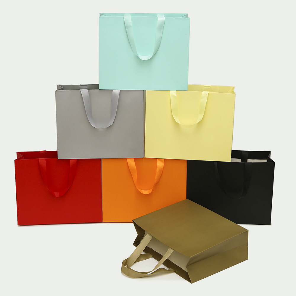 Bolsa de papel de cartón blanco florista bolsa de mano logotipo fija bolsa de regalo bolsa de regalo de Navidad bolsa de mano sin cintura