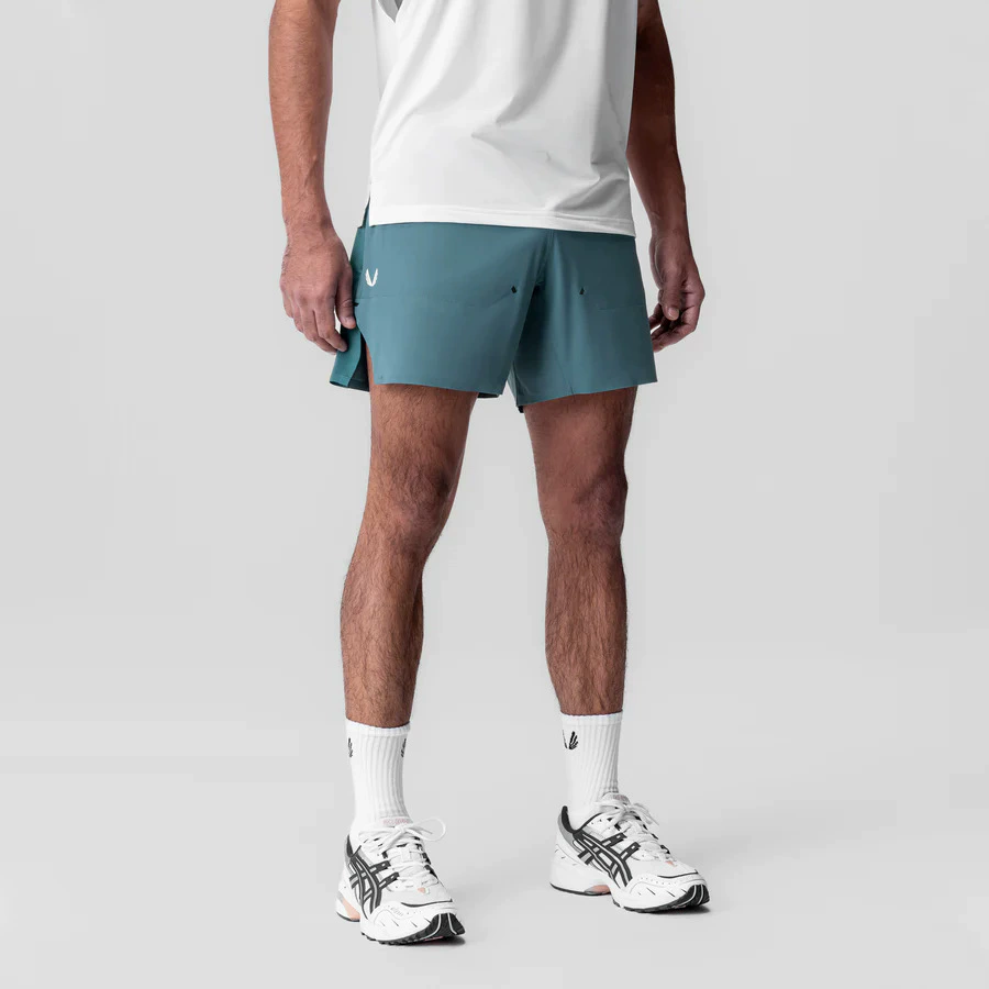 Мужские и женские повседневные дикие пары спортивные шорты весна и лето трансграничная эластичная книга быстродушные укороченные брюки тренировочные шорты