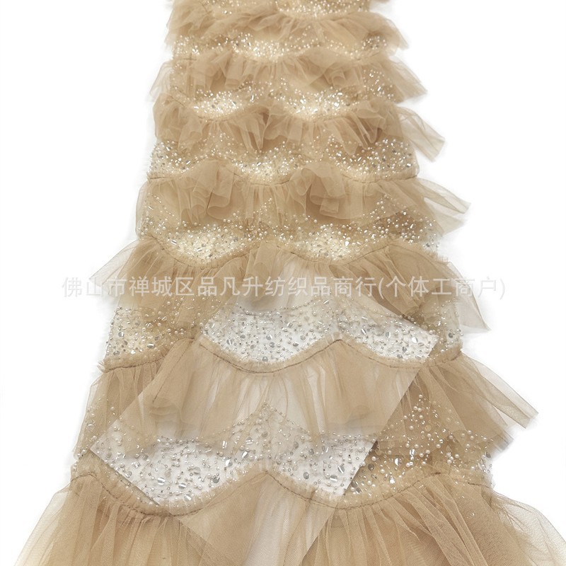 Falda de pastel laminada hecha a mano hilo de malla de perlas ligero lujoso vestido de aire de hadas de estilo de moda alta tela de vestido