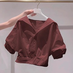 超見栄えの良い白いラペルパフスリーブシャツ女性用2025夏の新しいレイジースタイルルーズショートトップトレンディ