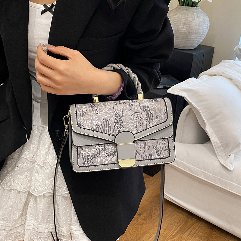 Bolso Baco de textura transfronteriza 2025 verano nuevo estilo bolso de hombro de estilo étnico bolso de mensajero de color de contraste retro mujer