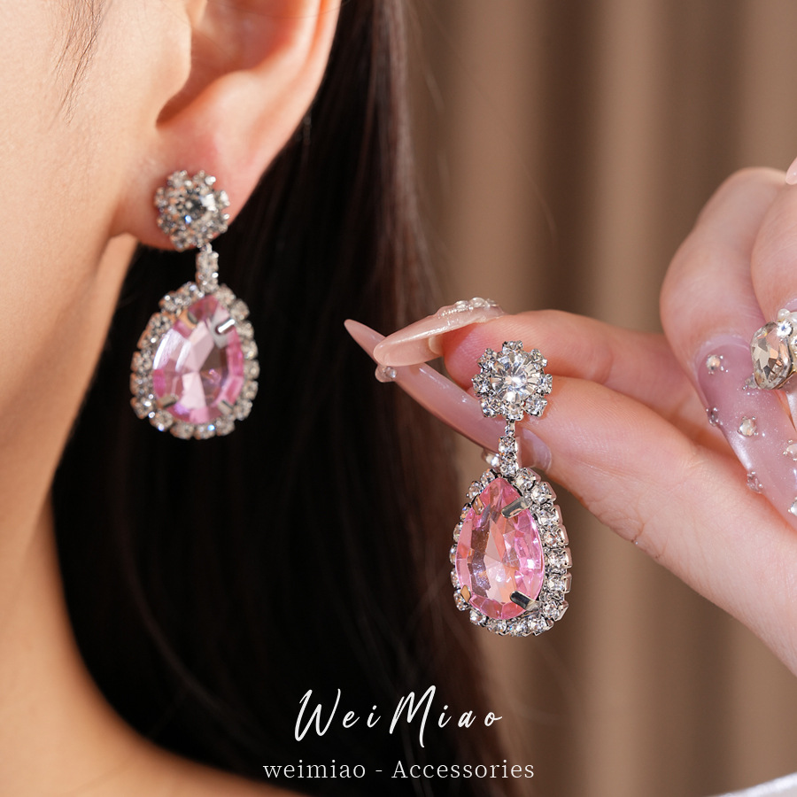 Collar de pendientes de gota de agua elíptica rosa ligero de lujo nicho cadena de clavícula temperamento delicado conjunto de joyas al por mayor