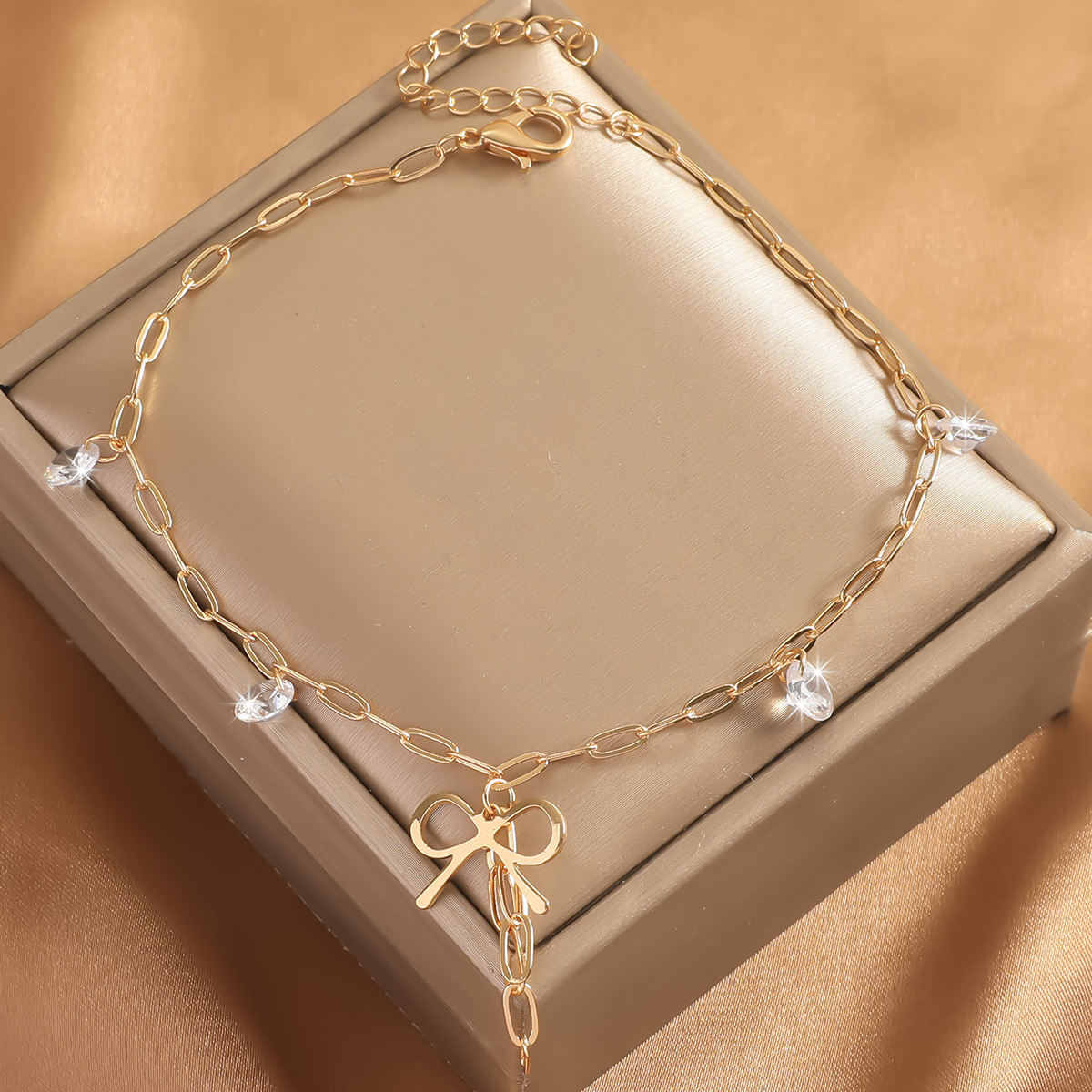 Transfronterizos de lujo ligero de alta calidad de zircon de cobre de moda simple accesorios de tobillas de mariposa para mujeres nuevos accesorios de pie de mariposa