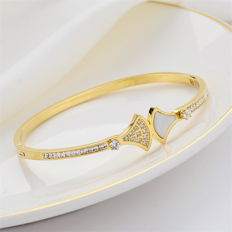Pulsera de titanio y acero para mujer, diseño moderno y sencillo, pulsera de lujo que no se desvanece, venta al por mayor en stock.
