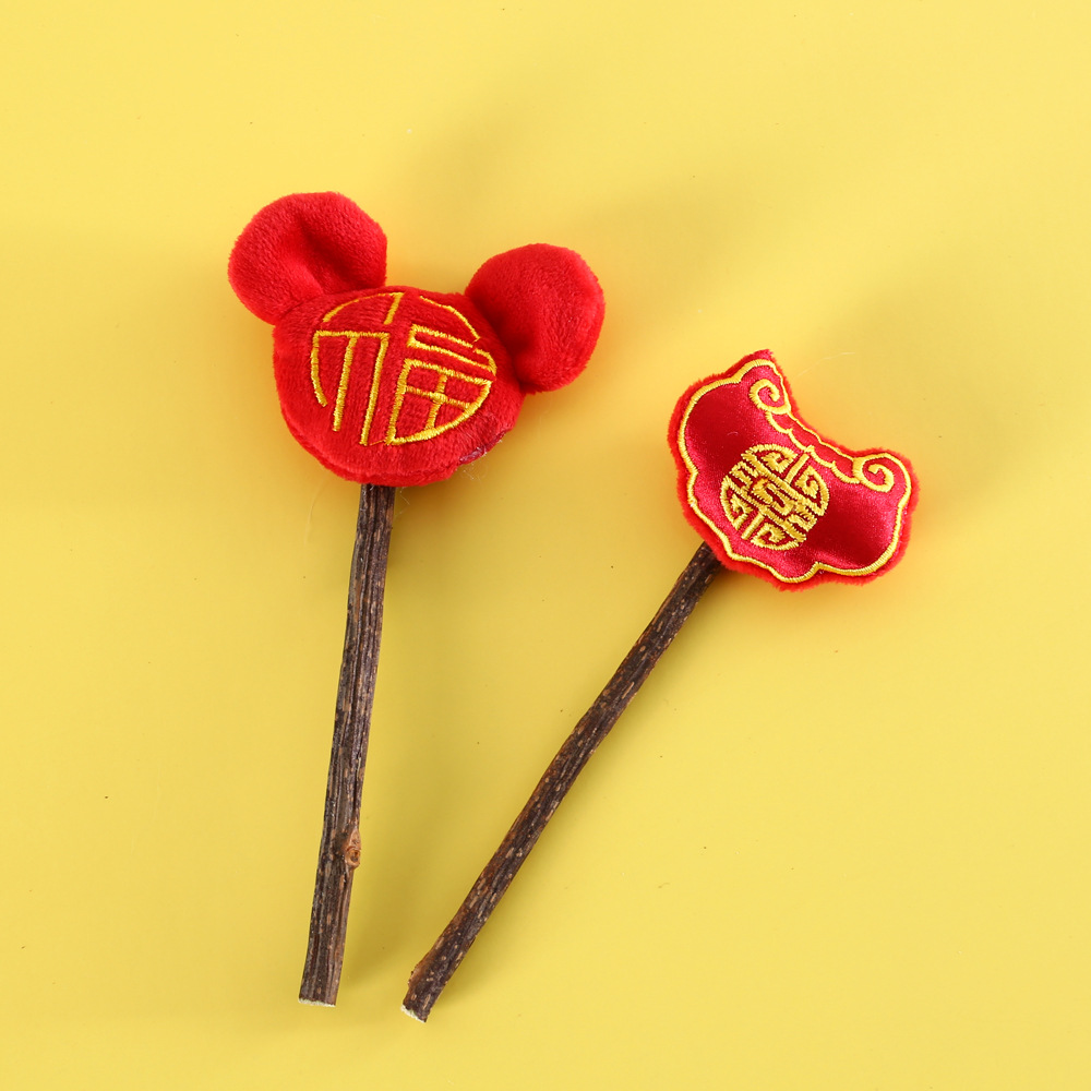 Mascota gato de dibujos animados felpa Mahjong Año Nuevo Fu molar Lollipop juguete mu Tianmiao limpieza dental snack interactivo palo