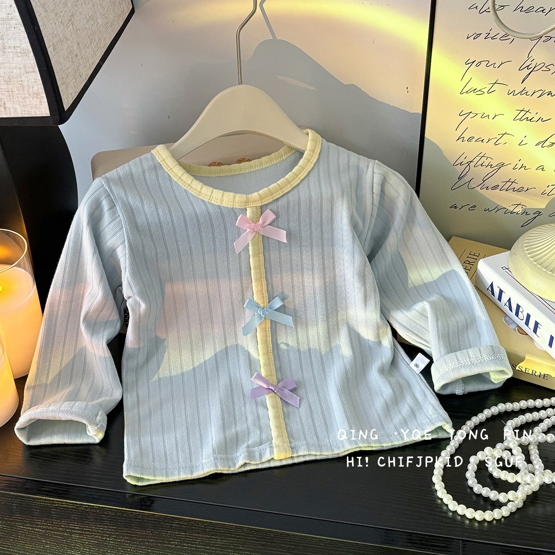 Primavera y otoño de los niños nuevos productos de bebés femeninos camisetas de fondo chaqueta arco coreana suéter universal adorable dulce al por mayor