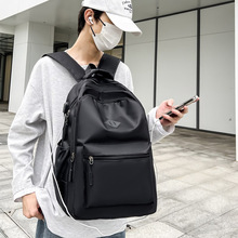 双肩包新款休闲大容量男女初高中大学生书包轻便旅行商务电脑背包