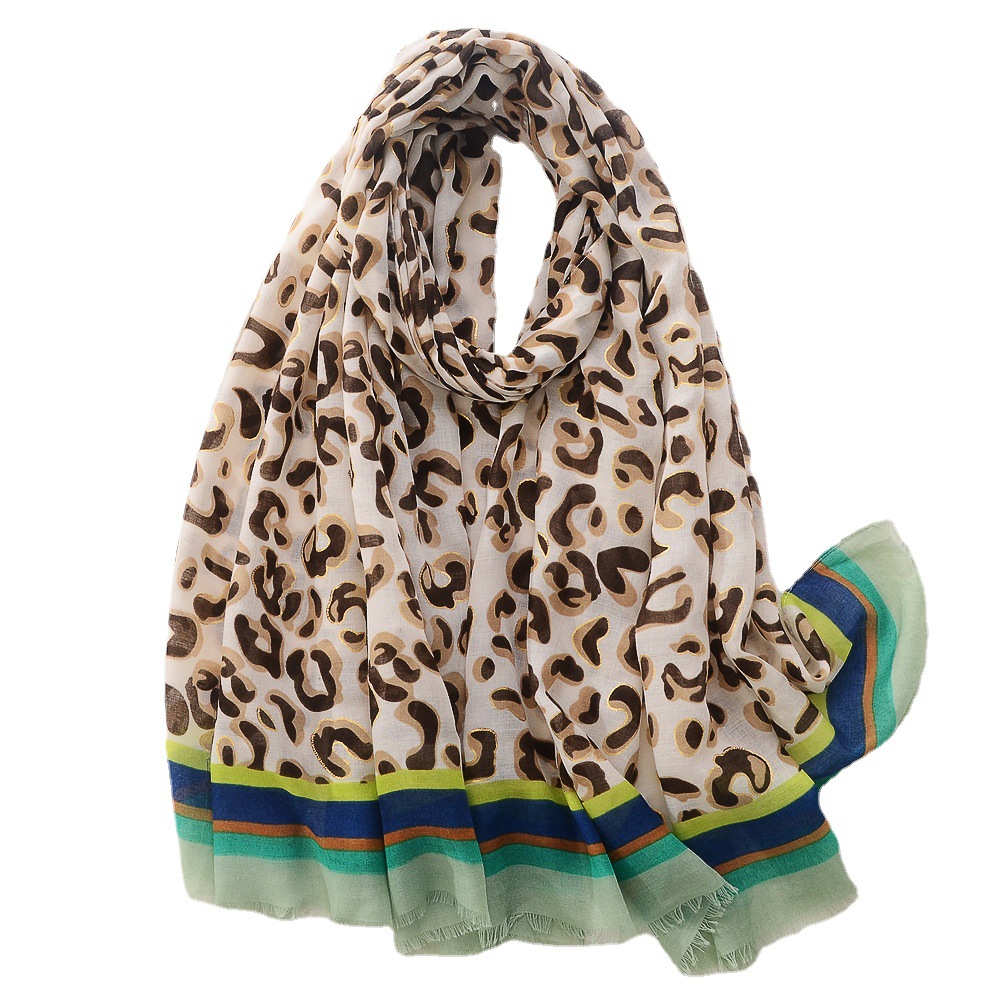 Moda estilo europeo y americano estampado de leopardo bronceado algodón y lino sensación bufanda de seda de moda todo fósforo bufanda grande viaje protector solar Toalla de playa para las mujeres