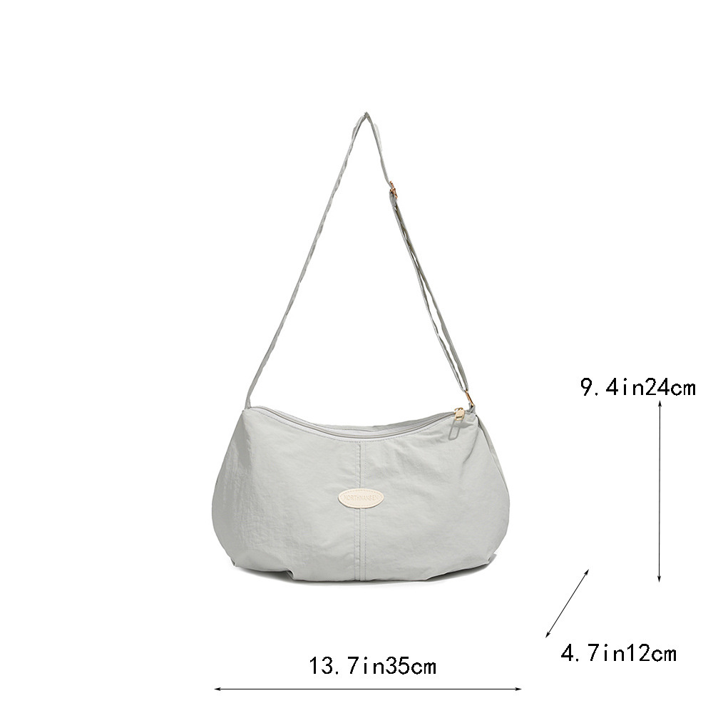 Bolso de color sólido universal 2025, nuevo bolso de bolsas de bolsas de bolsas de moda de hombro, mochila de viaje casual para hombres y mujeres.