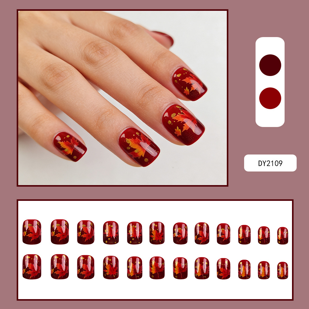 Comercio extranjero venta más alta de hojas de arce rojo oscuro vestir uñas de estilo europeo y americano brillante cara uña falsa 24 piezas de manicure de otoño y invierno image 3